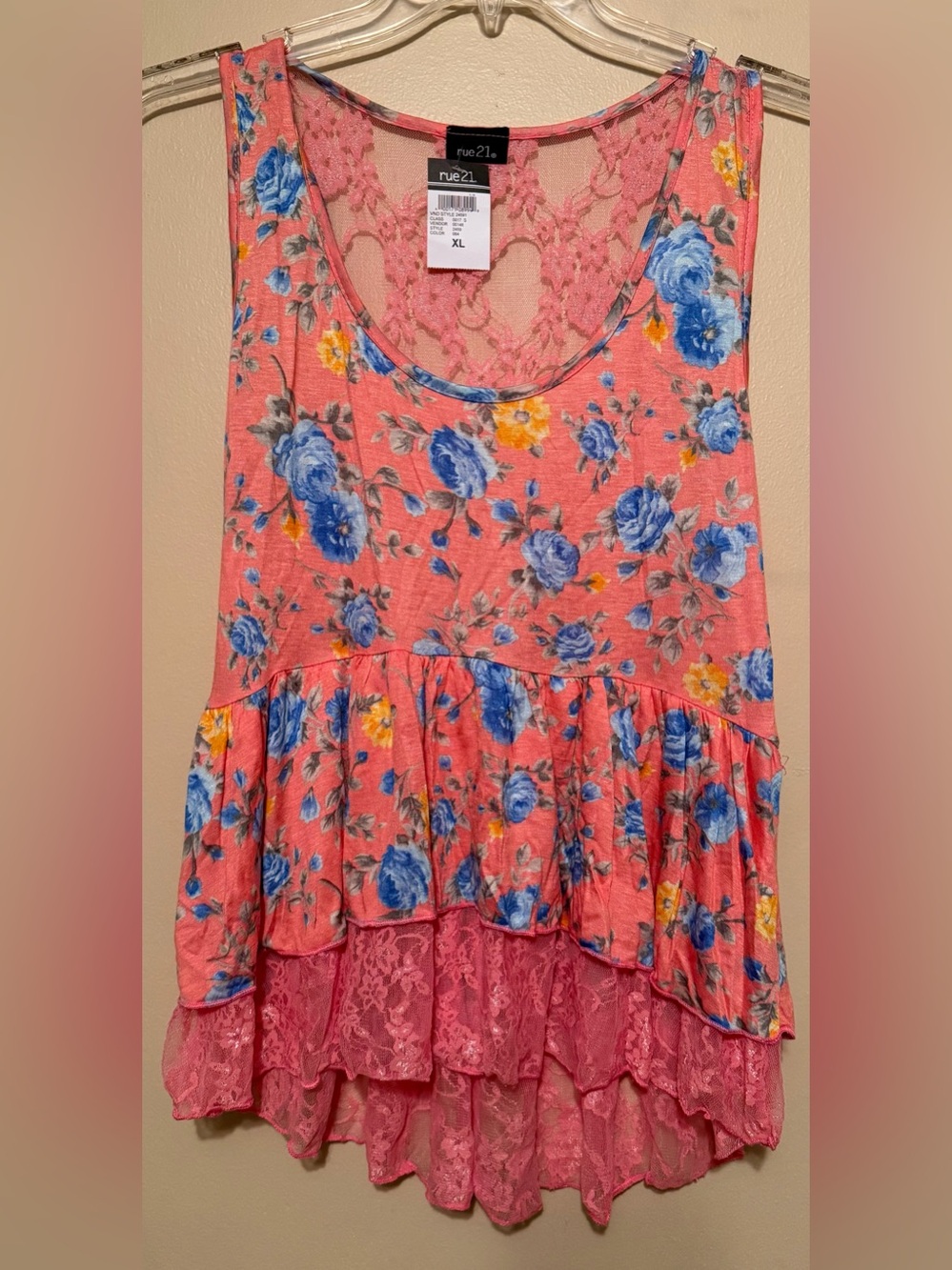 Floral lace peplum tank top featuring a vibrant pink/orange base w/ blue flowers